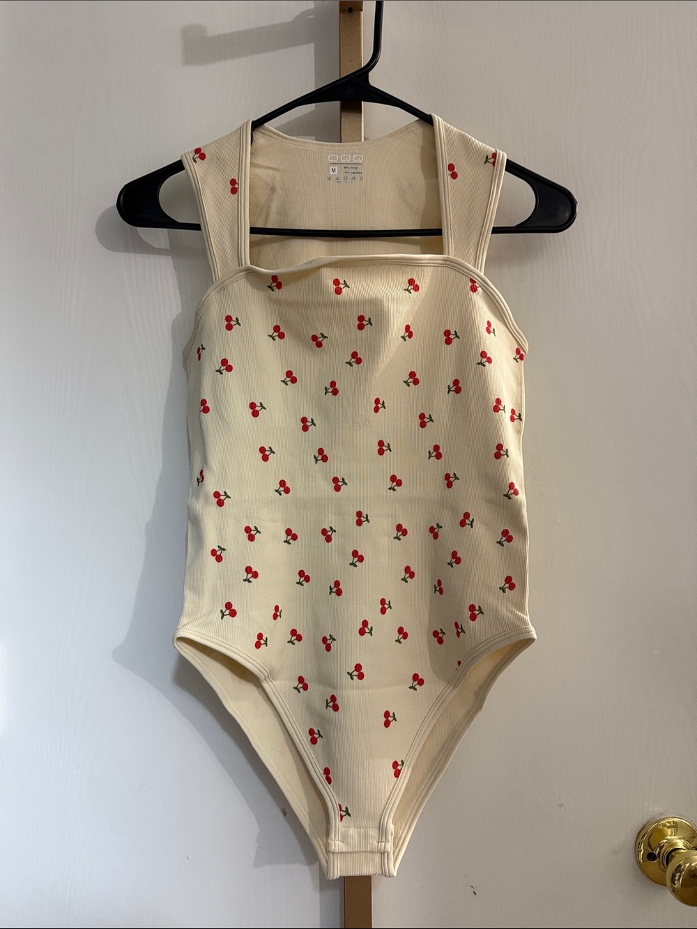 OQQ Ribbed Cream Tank Bodysuit